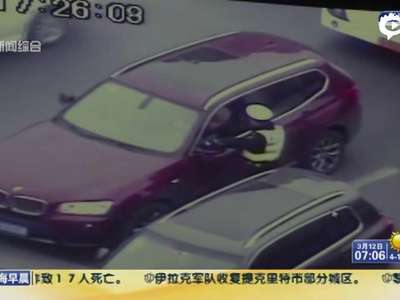 [视频]上海宝马强行转弯撞死交警全程监控 拖行数米