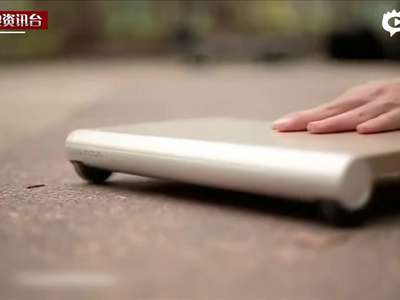 [视频]世界最小电动代步车面世 只有笔记本大小