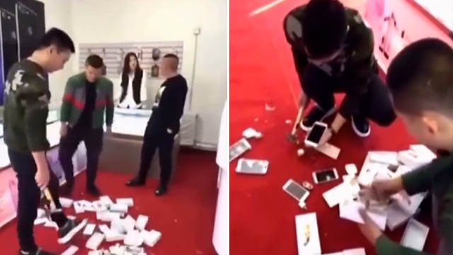 实拍男子砸iPhone店所有手机