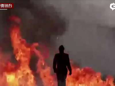 [视频]俄金发女郎穿测试防爆衣步入雷区 毫发未损