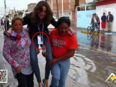 [视频]墨西哥女记者犯“公主病” 怕湿鞋让灾民抬着走